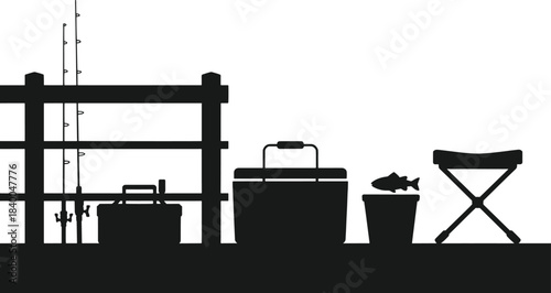 Black silhouette of fishing gear including rods tackle box cooler bucket with fish and folding stool