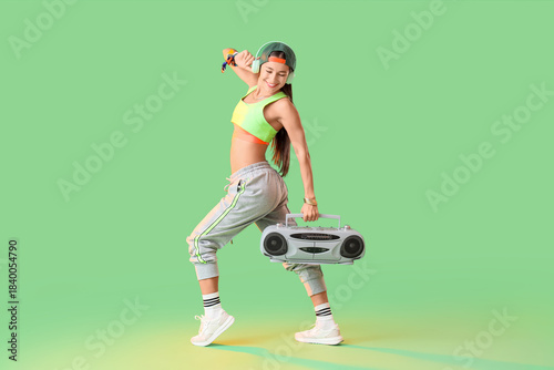 Female hip-hop dancer in he...