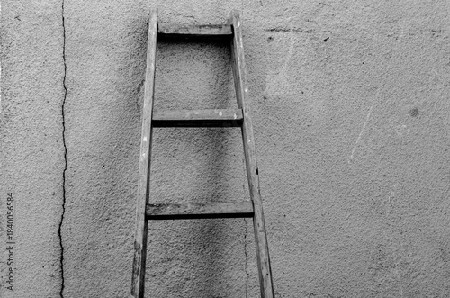 Old ladder leaning against the wall