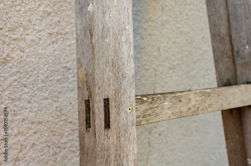 Old ladder leaning against the wall