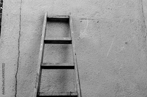 Old ladder leaning against the wall