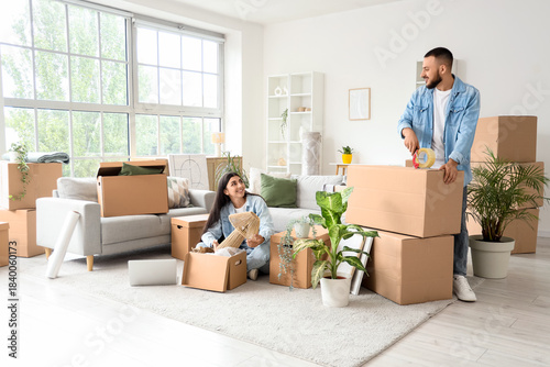 Young couple packing things...