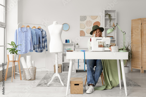 Female fashion designer sew...
