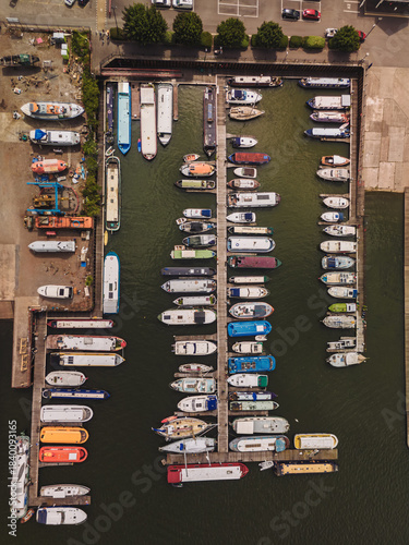 Bristol UK: 28th July 2025: Topdown drone view of boats in marina and river Avon near Bristol, showcasing activity on the water