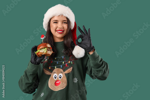 Pretty young woman in Santa...