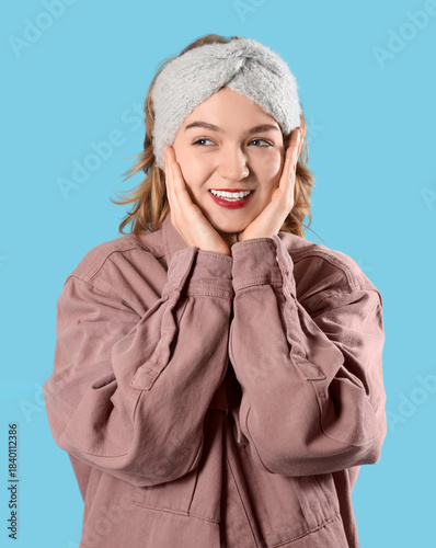 Smiling young woman in head...