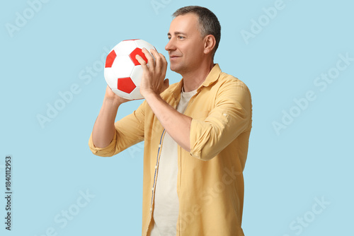 Handsome mature man playing...