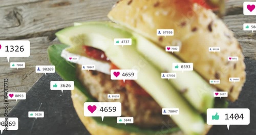 Reactions growing, camera pulling back, focusing, revealing seeded slider on slate showing likes