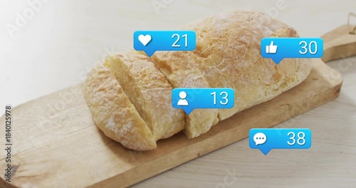 Blue bubbles starting single, appearing around sliced loaf on board, counters rising showing likes