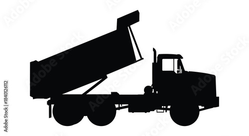 A striking black silhouette of a heavy duty dump truck with its bed raised silhouette