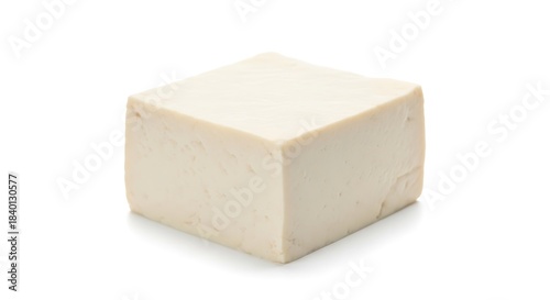 Fresh raw tofu block isolated for healthy plant-based protein isolated on white background