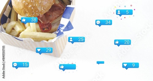 Takeout box sliding in, showing burger and fries, badges spawning, counts rising showing popularity