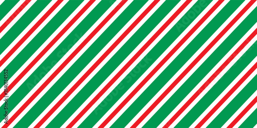 Christmas seamless pattern. Red and green diagonal stripes background. Candy cane repeating decoration wallpaper. Winter holiday lines backdrop. vector ilustration eps 10
