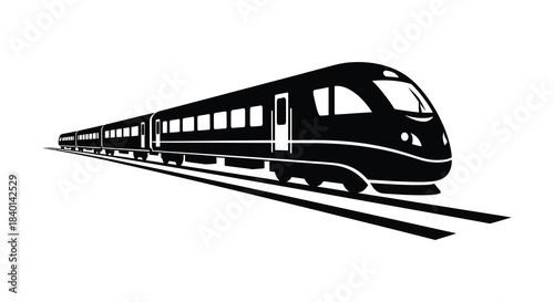 A sleek modern high speed passenger train travels along the tracks a striking silhouette