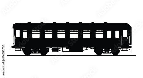 A striking black silhouette of a vintage passenger train car on railway tracks silhouette