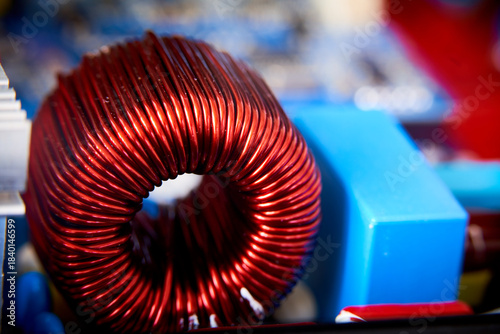 Electronic circuit board with electrical component. Close up. Selective focus.