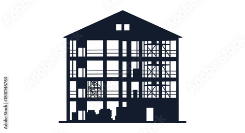 A stark black building facade with many windows presented as a bold silhouette