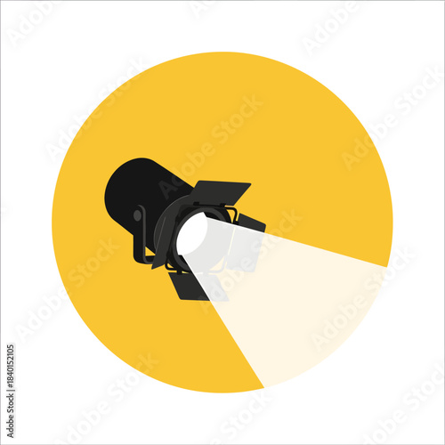 A stylized black stage spotlight with open barn doors casts a broad cone of light against a solid yellow circular background in this modern, flat vector illustration