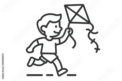 Happy boy running outdoors and flying a kite during summer fun