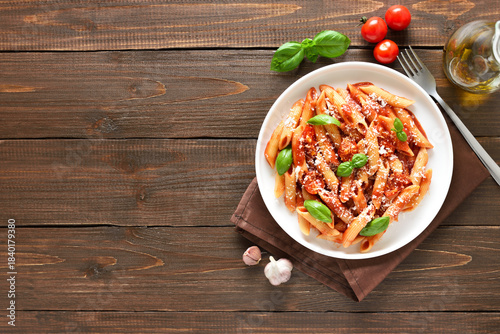 Italian penne pasta with tomato bolognese sauce