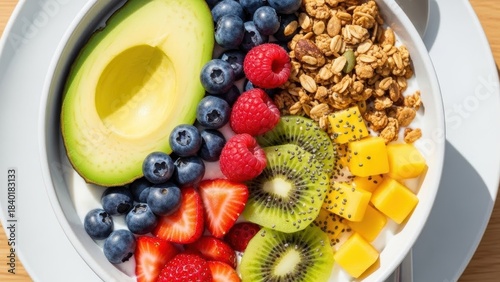 Vibrant Smoothie Bowl: A colorful smoothie bowl featuring an array of fresh fruits, from creamy avocado to juicy berries, invites a refreshing and nutritious culinary experience
