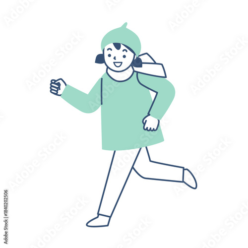 冬の上着を着て走る笑顔の女の子