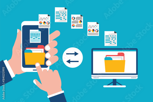 File transfer. Hand holding smartphone with folder on screen and documents transferred to computer.