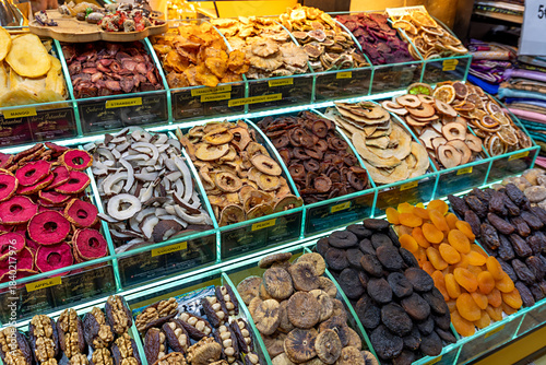 At the Grand Bazaar in Istanbul, visitors can find an enticing array of sweets including dried fruits, nuts, and colorful candies, showcasing traditional Turkish delights and local flavors.