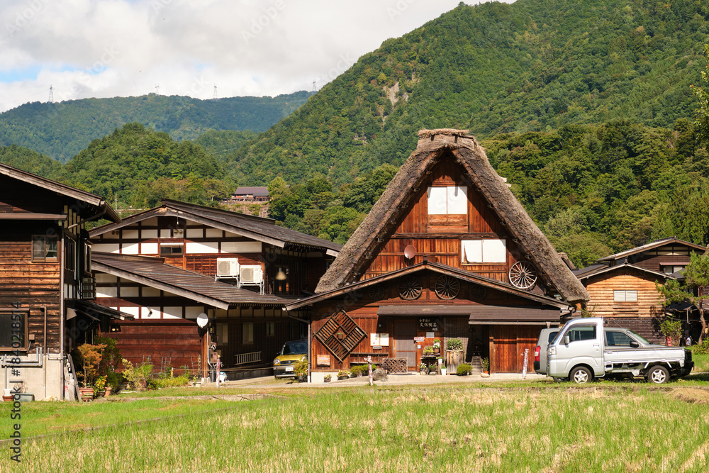 Fototapeta premium Shirakawa go village showcasing traditional gassho zukuri farmhouses nestled in a rural landscape