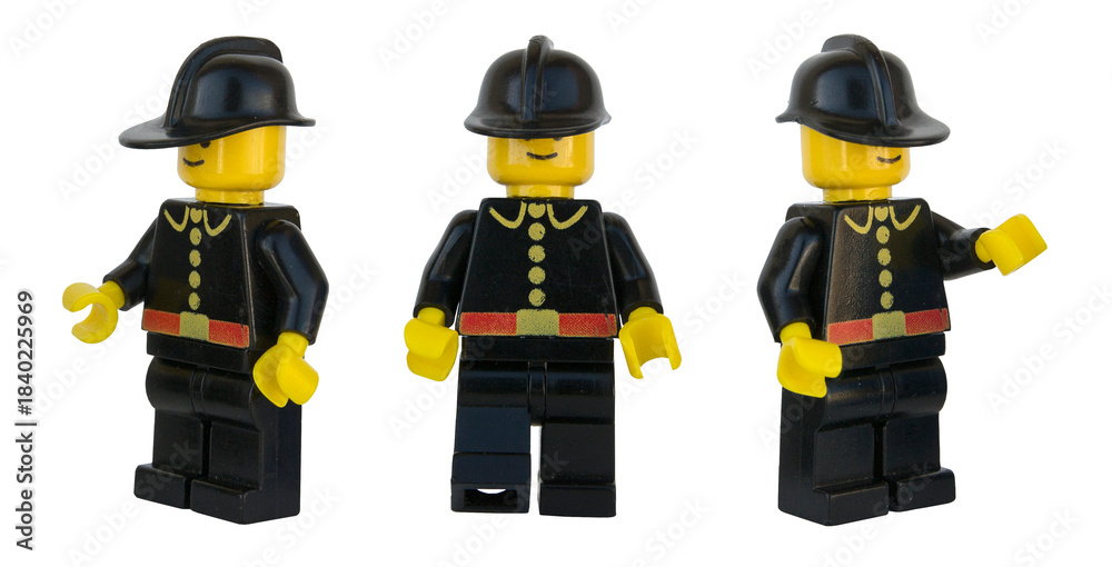 Obraz premium Figura de bombero de LEGO oficial. Tres posturas. Imagen aislada 