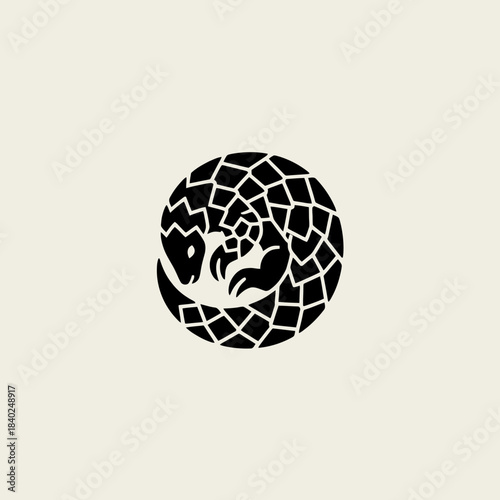 A stylized black pangolin curled into a protective ball, forming a circular logo on a light background.
