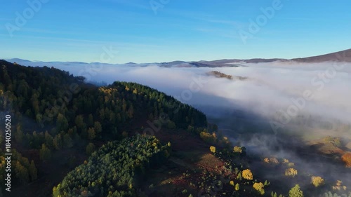 Aerial view of a cloud inversion during sunrise in the cairngorms of scotland