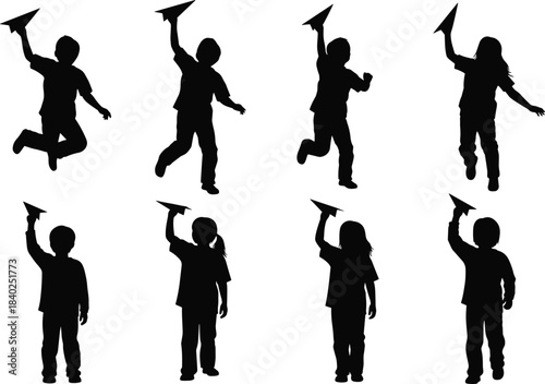 Children silhouette playing with paper airplanes, joyful childhood activity, outdoor fun, creative imagination, kids motion pose, black vector art, stock illustration