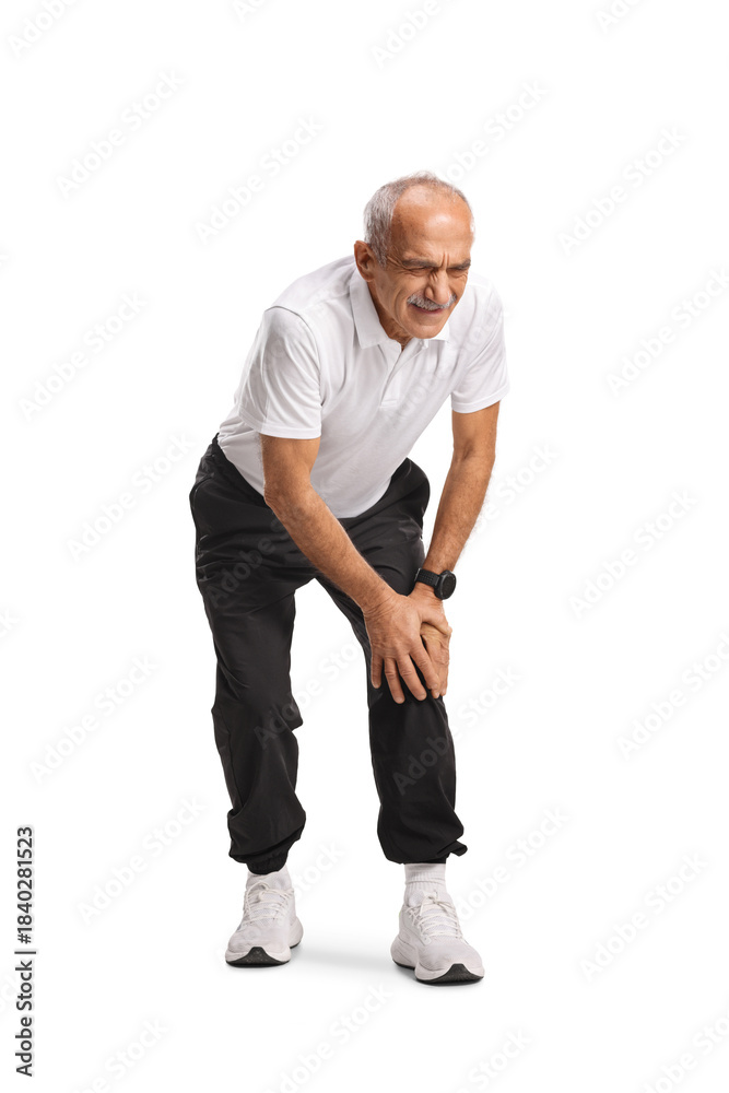 Fototapeta premium Full length shot of an active senior man with knee pain