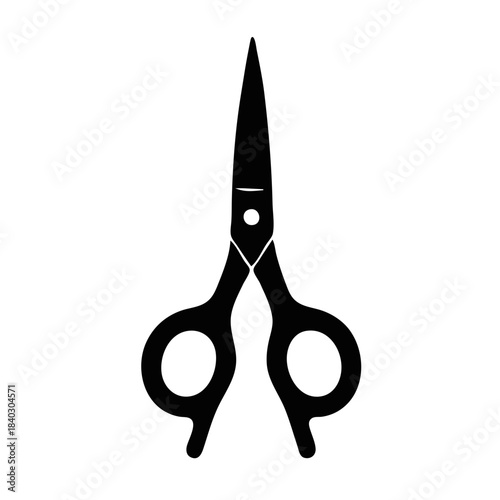 Scissors in black silhouette on white background  