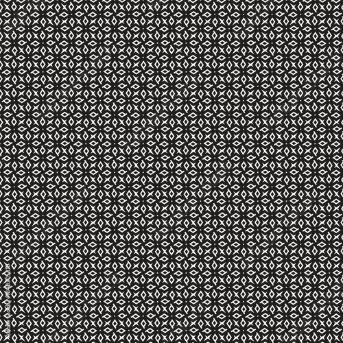 Intricate black and white geometric pattern with repeating tessellated starburst motifs creating a complex visual texture