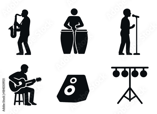 Silhouettes of musicians with instruments and stage equipment in shadowy setting