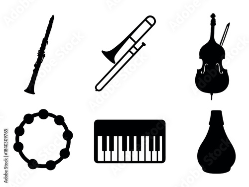 Silhouettes of musical instruments on dark background