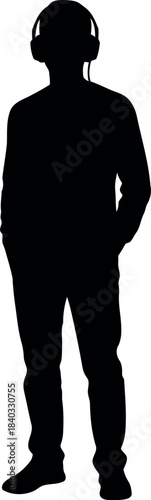 Silhouette of a person with headphones, standing in a relaxed pose, hands seemingly in pockets, embodying anonymity and focus on audio, a full-length black shadow isolated on a clean white background.