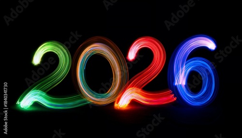 2026 Neon type vibrant color light on black background Fireworks illuminated Holiday celebration banner