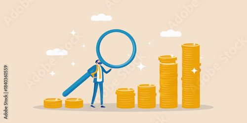 A person examines growing financial gains with a magnifying glass