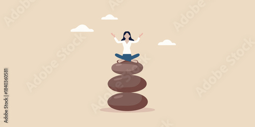 Woman meditating on stacked stones finding balance and peace in nature