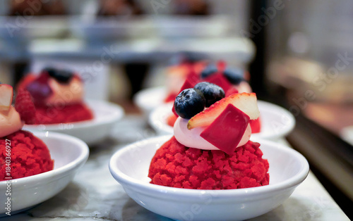  Close up of exquisite gourmet French pastry dessert served on a small plate for fine dining