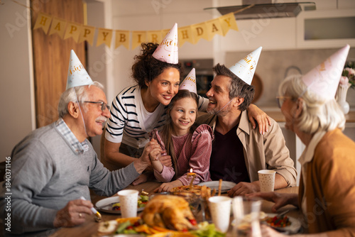 Multi-Generational Family Celebrating a Joyful Birthday at Home Together