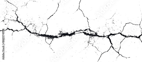 Weathered black and white grunge wall with scratched background. damaged aged stone surface featuring abstract cracked pattern.