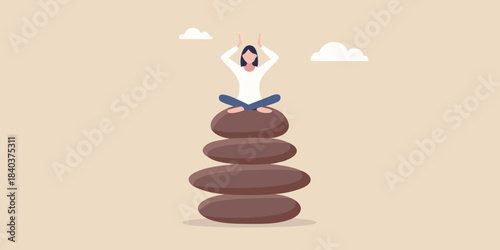 Woman meditating in a lotus position atop a balanced stone tower