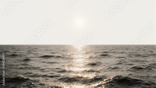 Sunlight dancing on the oceans surface, creating a shimmering path of light.