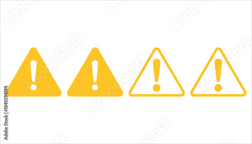 Four yellow triangular warning signs with exclamation marks on white background alert attention