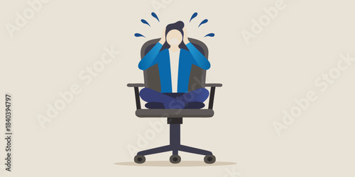 Overwhelmed professional sits in chair head in hands experiencing stress and burnout