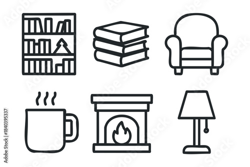 Cozy home atmosphere with books, coffee, and a warm fireplace setup